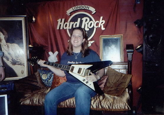 Me holding Jimi Hendrix's guitar